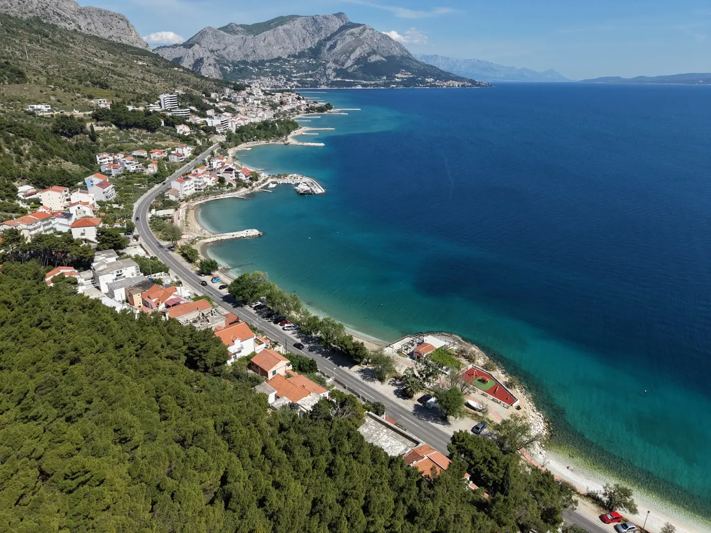 Aerial view of a coastal village, beaches and the sea
